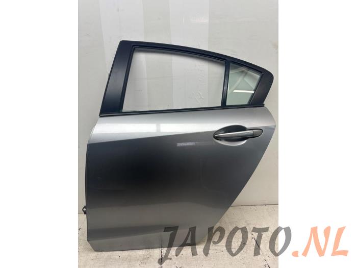 Drzwi lewe tylne wersja 4-drzwiowa z Mazda 3 (BL12/BLA2/BLB2) 1.6 CiTD 16V 2012