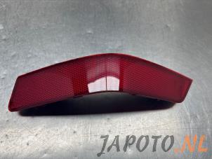 Używane Element odblaskowy zderzaka lewy tyl Nissan X-Trail (T32) 1.6 DIG-T 16V Cena € 24,95 Procedura marży oferowane przez Japoto Parts B.V.
