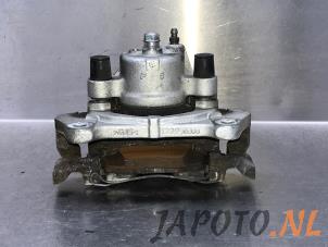 Używane Zacisk hamulcowy prawy przód Toyota Yaris IV (P21/PA1/PH1) 1.5 12V Hybrid 115 Cena € 149,95 Procedura marży oferowane przez Japoto Parts B.V.