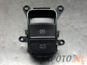 Usados Interruptor de freno de mano Hyundai Tucson (NX) 1.6 T-GDI Hybrid 48V HTRAC Precio € 19,95 Norma de margen ofrecido por Japoto Parts B.V.