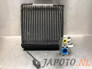 Usados Evaporador de aire acondicionado Nissan Micra (K13) 1.2 12V DIG-S Precio € 74,95 Norma de margen ofrecido por Japoto Parts B.V.
