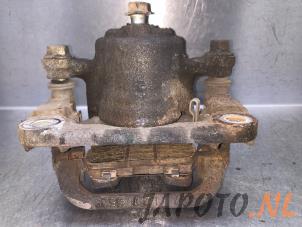 Used Rear brake calliper, right Nissan Qashqai (J10) 2.0 16V Price on request offered by Japoto Parts B.V.