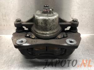 Used Front brake calliper, left Hyundai iX20 (JC) 1.6i 16V Price on request offered by Japoto Parts B.V.