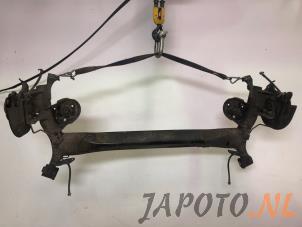 Used Rear-wheel drive axle Nissan Qashqai (J11) 1.2 DIG-T 16V Price on request offered by Japoto Parts B.V.