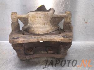 Used Front brake calliper, right Toyota Corolla (E11) 1.6 16V Price € 14,95 Margin scheme offered by Japoto Parts B.V.