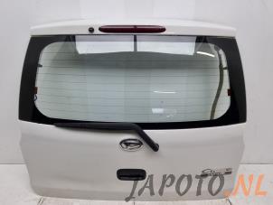 Używane Tylna klapa Daihatsu Cuore (L251/271/276) 1.0 12V DVVT Cena € 150,00 Procedura marży oferowane przez Japoto Parts B.V.