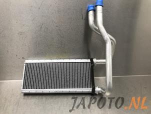 Used Heating radiator Mitsubishi Space Star (A0) 1.0 12V Price € 59,95 Margin scheme offered by Japoto Parts B.V.