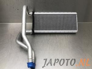 Used Heating radiator Mitsubishi Space Star (A0) 1.2 12V Price € 59,95 Margin scheme offered by Japoto Parts B.V.