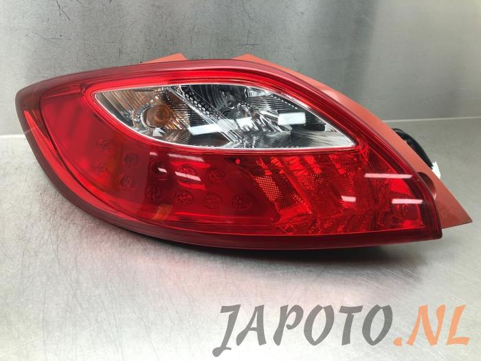 Taillight, left from a Mazda 2 (DE) 1.3 16V MZR 2013