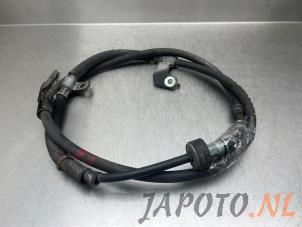 Używane Linka hamulca recznego Kia Picanto (JA) 1.0 T-GDI 12V Cena na żądanie oferowane przez Japoto Parts B.V.