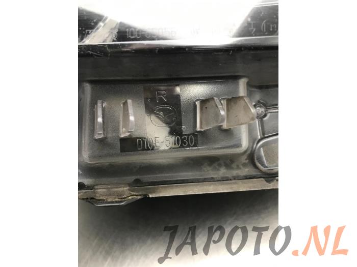 Optique avant principal droit d'un Mazda CX-3 1.5 Skyactiv D 105 16V 2015