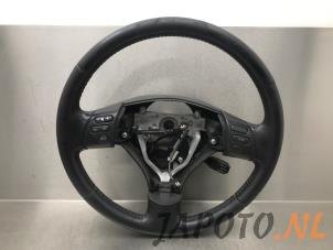 Used Steering wheel Toyota Corolla Verso (R10/11) 2.2 D-4D 16V Price on request offered by Japoto Parts B.V.