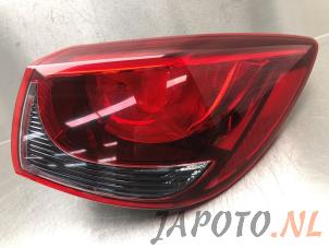 Używane Tylne swiatlo pozycyjne prawe Mazda 2 (DJ/DL) 1.5 SkyActiv-G 90 Cena € 100,00 Procedura marży oferowane przez Japoto Parts B.V.