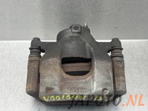 Used Front brake calliper, left Toyota Aygo (B40) 1.0 12V VVT-i Price on request offered by Japoto Parts B.V.