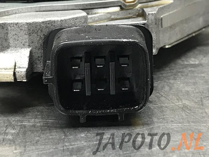 Ignition module from a Toyota Yaris IV (P21/PA1/PH1) 1.5 12V Hybrid 115 2023