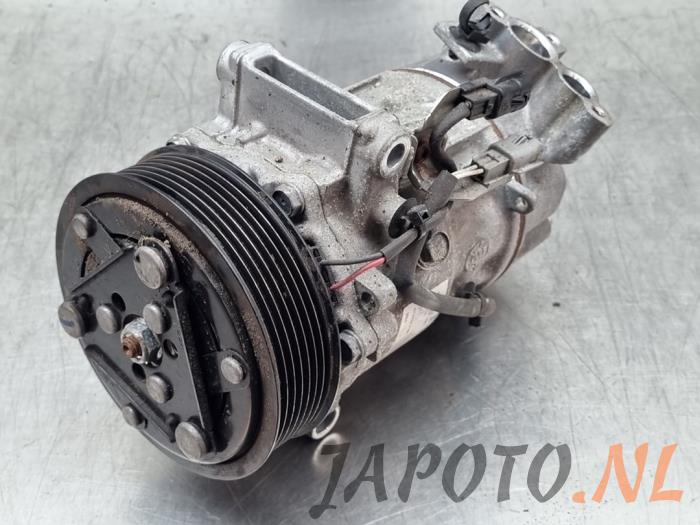 Usagé Compresseur de clim Nissan Juke (F16) 1.0 DIG-T 12V Prix € 262,45 Règlement à la marge proposé par Japoto Parts B.V.