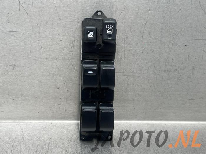 Usados Interruptor combinado de ventanillas Mitsubishi Lancer Sportback (CX) 1.8 MIVEC 16V Precio € 26,20 Norma de margen ofrecido por Japoto Parts B.V.