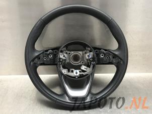 Used Steering wheel Toyota Yaris Cross (PB1/PJ1) 1.5 12V Hybrid 115 Price € 124,95 Margin scheme offered by Japoto Parts B.V.