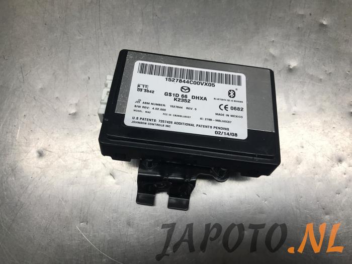 Usados Módulo Bluetooth Mazda 6 SportBreak (GH19/GHA9) 2.0i 16V S-VT Precio € 157,45 Norma de margen ofrecido por Japoto Parts B.V.