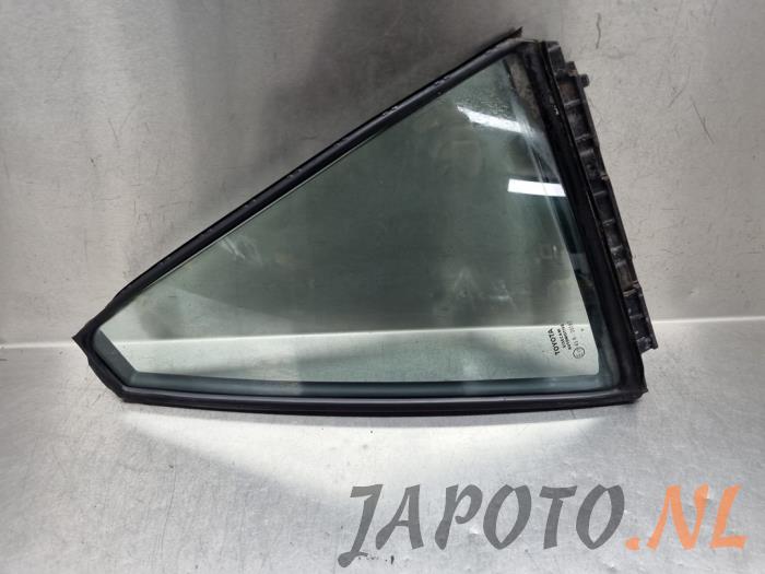 Usados Ventanilla triangular derecha detrás Toyota Corolla Touring Sport (E21/EH1) 1.8 16V Hybrid Precio € 52,45 Norma de margen ofrecido por Japoto Parts B.V.