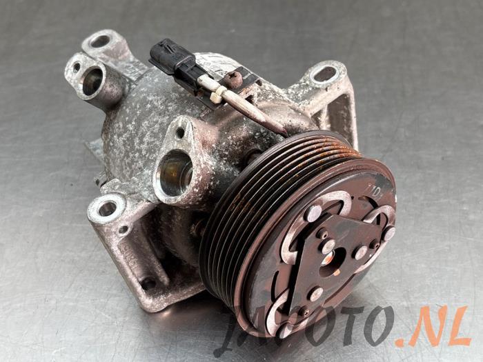 Usagé Pompe clim Nissan Micra (K14) 0.9 IG-T 12V Prix € 209,95 Règlement à la marge proposé par Japoto Parts B.V.