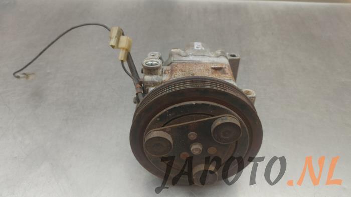 Usagé Pompe clim Daihatsu Materia 1.3 16V Prix € 157,45 Règlement à la marge proposé par Japoto Parts B.V.