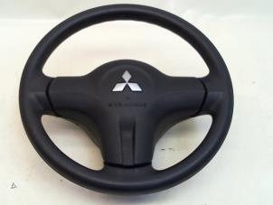 Used Left airbag (steering wheel) Mitsubishi Colt (Z2/Z3) 1.1 12V Price € 74,95 Margin scheme offered by Japoto Parts B.V.