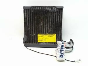 Used Air conditioning vaporiser Nissan Note (E11) 1.4 16V Price € 29,99 Margin scheme offered by Japoto Parts B.V.