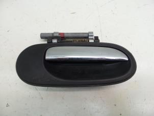 Used Front door handle 4-door, right Nissan Almera Tino (V10M) 1.8 16V Price € 9,99 Margin scheme offered by Japoto Parts B.V.