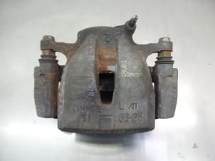 Used Front brake calliper, left Toyota Prius Plus (ZVW4) 1.8 16V Price € 60,00 Margin scheme offered by Japoto Parts B.V.