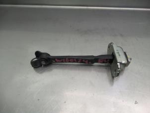 Used Front door stop 4-door, right Nissan Note (E12) 1.2 68 Price € 14,99 Margin scheme offered by Japoto Parts B.V.