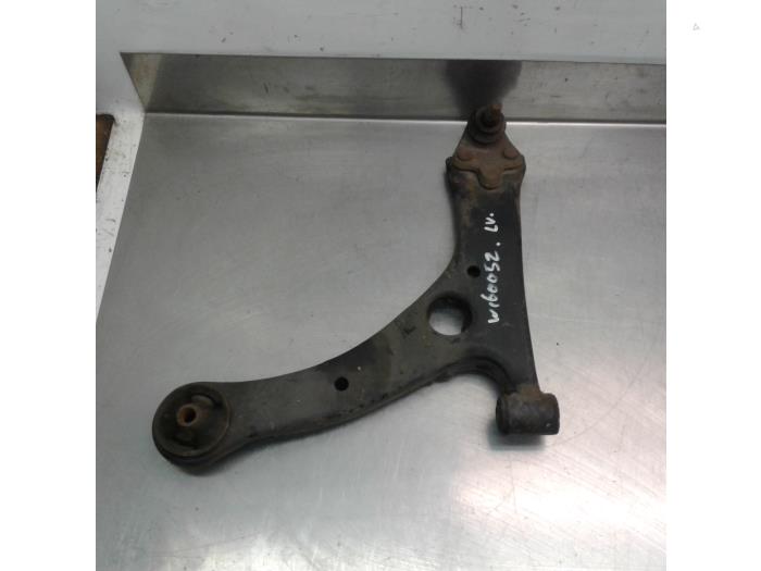 Front lower wishbone, left from a Toyota Corolla Verso (R10/11) 1.6 16V VVT-i 2006