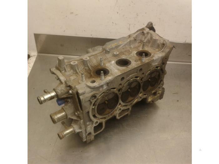 Cylinder head from a Nissan Micra (K13) 1.2 12V 2011