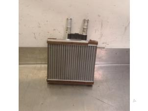 Usados Radiador de calefactor Chevrolet Aveo (250) 1.2 16V Precio € 34,95 Norma de margen ofrecido por Japoto Parts B.V.