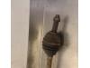 Front drive shaft, left from a Nissan Note (E11) 1.5 dCi 86 2006