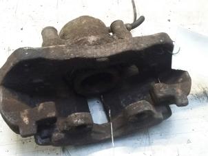 Used Front brake calliper, left Volkswagen LT II 2.5 TDi Price € 30,00 Margin scheme offered by Poolman autodemontage