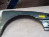 Front wing, right from a Volvo V70 2006