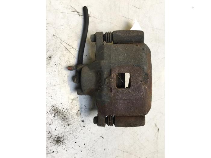 Front brake calliper, left from a Jeep Compass (PK) 2.2 CRD 16V 4x2 2013