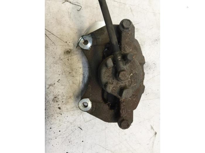 Front brake calliper, left from a Jeep Compass (PK) 2.2 CRD 16V 4x2 2013