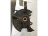Knuckle, front left from a Renault Clio III Estate/Grandtour (KR) 1.2 16V TCe 2011