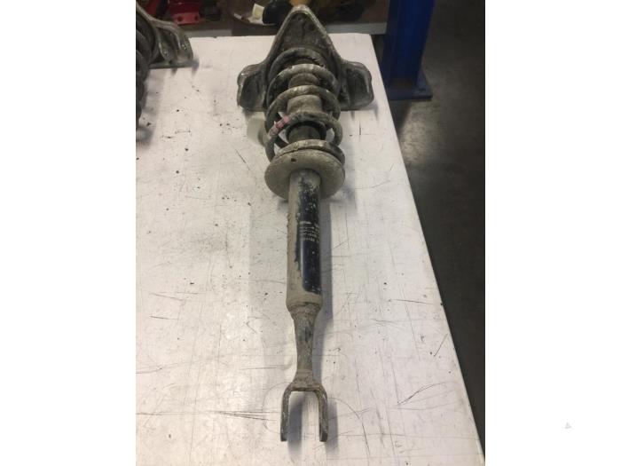 Front shock absorber rod, left from a Audi A4 Avant (B7) 2.0 TDI 2008