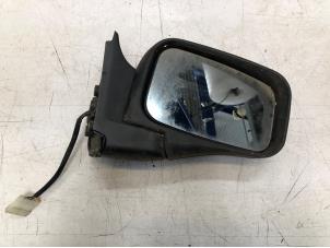 Used Wing mirror, right Opel Frontera Sport (SUD2) 2.0i Price € 20,00 Margin scheme offered by Poolman autodemontage