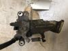 Rear brake calliper, left from a Nissan Almera Tino (V10M)  2001