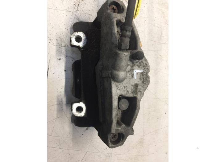 Front brake calliper, left from a Volvo V60 I (FW/GW) 2.4 D6 20V Plug-in Hybrid AWD 2014