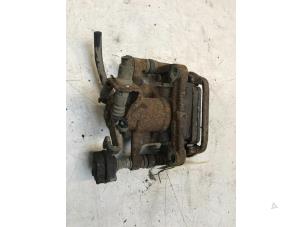 Used Rear brake calliper, left Chevrolet Cruze SW 2.0 D 16V Price € 30,00 Margin scheme offered by Poolman autodemontage