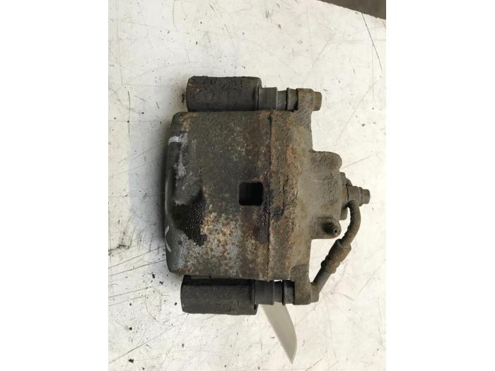 Front brake calliper, left from a Mazda 6 SportBreak (GH19/GHA9) 2.2 CDVi 16V 163 2011