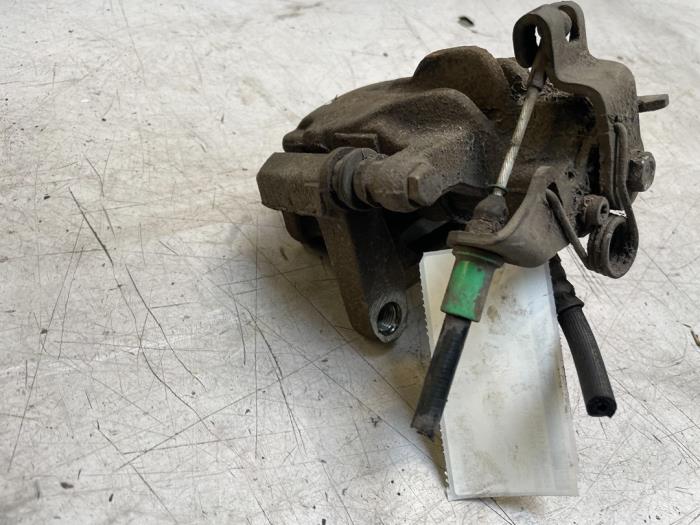 Rear brake calliper, left from a Renault Trafic (1FL/2FL/3FL/4FL) 1.6 dCi 120 Twin Turbo 2014