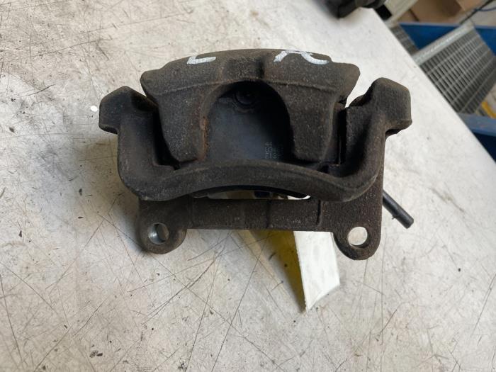 Rear brake calliper, left from a Renault Trafic (1FL/2FL/3FL/4FL) 1.6 dCi 120 Twin Turbo 2014
