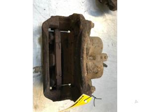 Used Front brake calliper, left Nissan Navara (D40) 2.5 dCi 16V 4x4 Price € 30,00 Margin scheme offered by Poolman autodemontage
