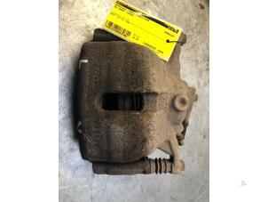Used Front brake calliper, left Volkswagen Caddy IV 2.0 TDI 102 Price € 30,00 Margin scheme offered by Poolman autodemontage